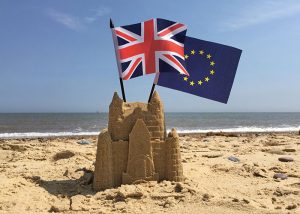 united kingdom and European Union flags on the beach