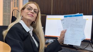 Legal consultant reviewing IB diploma recognition documents for Italy