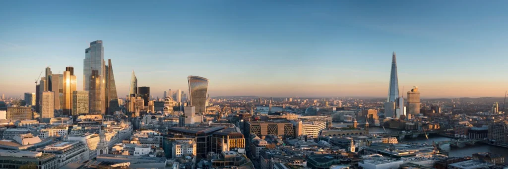London skyline at sunset over the River Thames